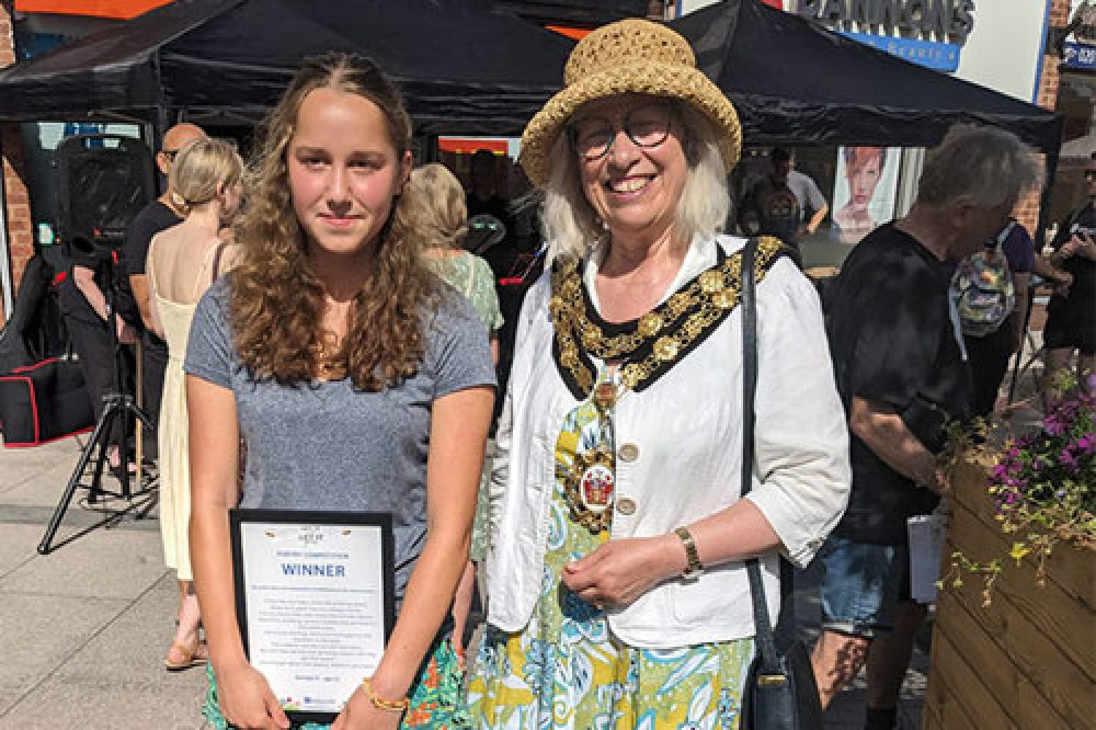 Mayor of Richmond upon Thames, Cllr Suzette Nicholson with poetry winner. (Photo Credit: Richmond Council). 