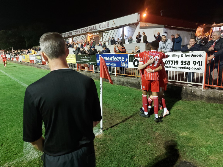 Hugs all round as the Robins celebrate another goal but the next minutes were challenging 