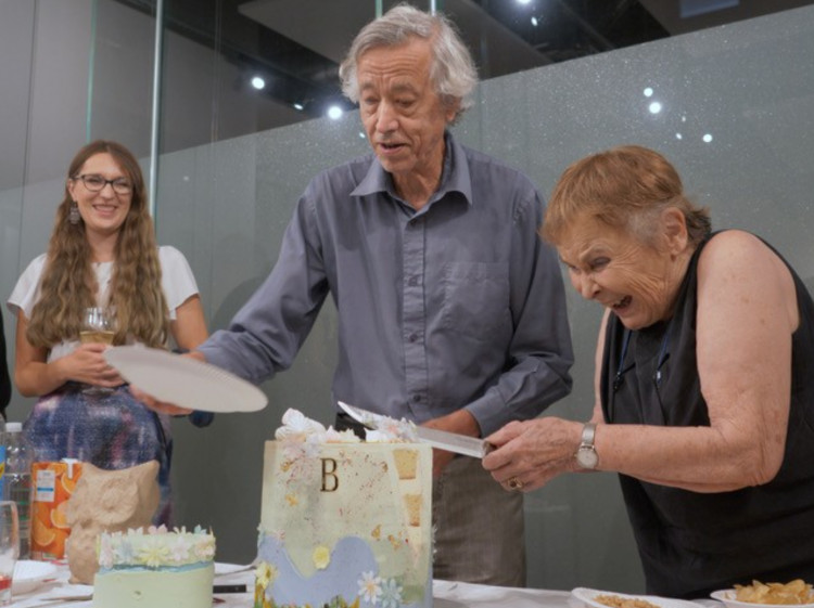 Kay FitzHerbert cuts the 50-year commemorative cake, assisted by BRCS President, Nic Ferriday and Laura Bacon, wildlife photographer and BRCS member (credit: Richard Carter).