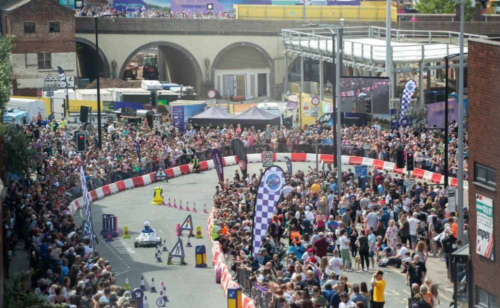 Over 15,000 spectators attended the 2023 Krazy Races soapbox race in Stockport town centre. A racer is pictured here reaching the base of the slope down from St Peter's Square (Image - Krazy Races)