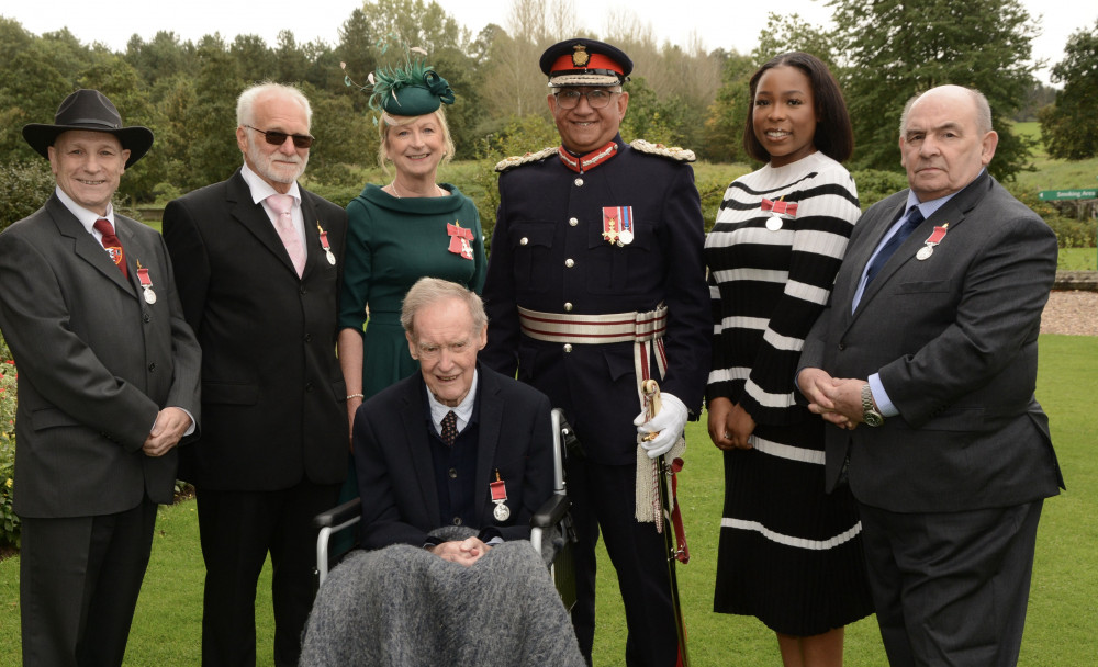 Paul Gardner, Brian Jackson, Barbara Chantrell, Lord-Lieutenant Mike Kapur, Jessica Davey, William (Bill) Brown, from Coalville. Front – Richard Easom. 