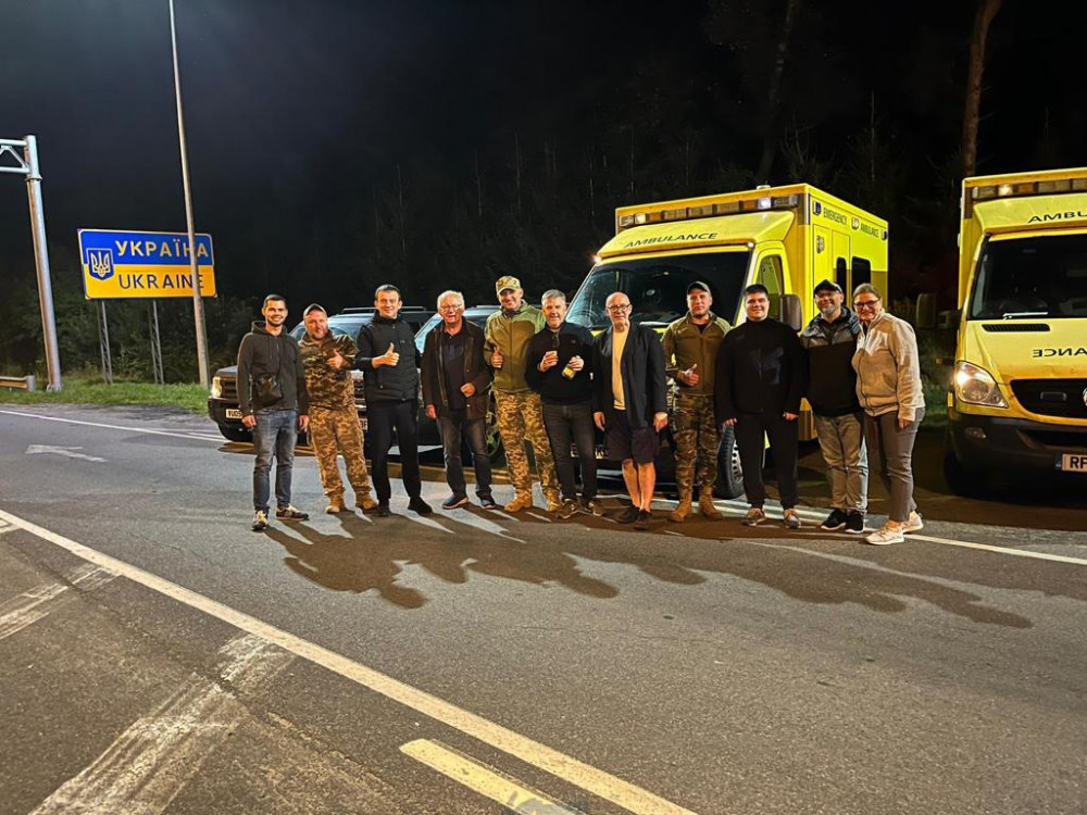 At the Poland-Ukraine border, handing over the four vehicles to members of Ukraine’s 45th Air Assault Brigade and civilian support team (image supplied)