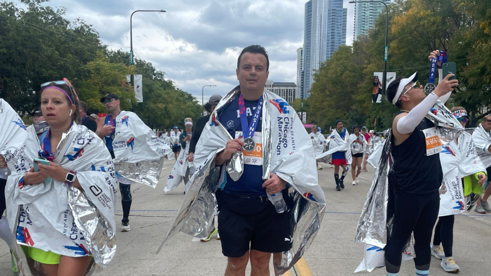 Matt Maslen after completing the Chicago Marathon (Pete's Dragons)