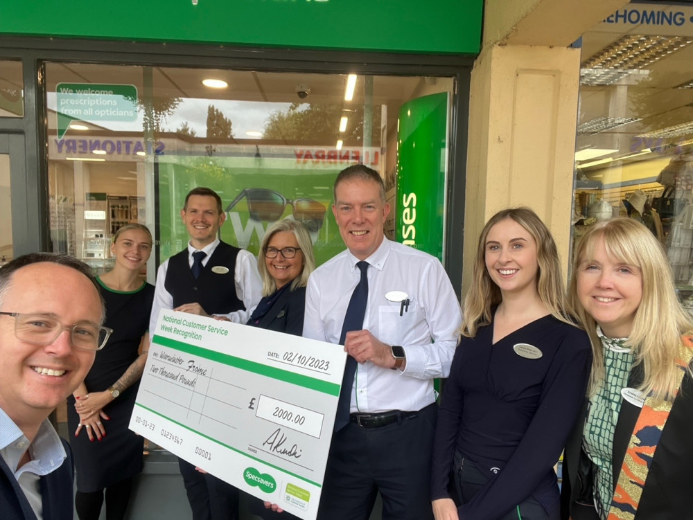 The Specsavers Frome team being rewarded for their customer service