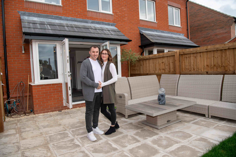 Gary and Kayleigh outside their new Bellway home. Photos: Bellway Homes