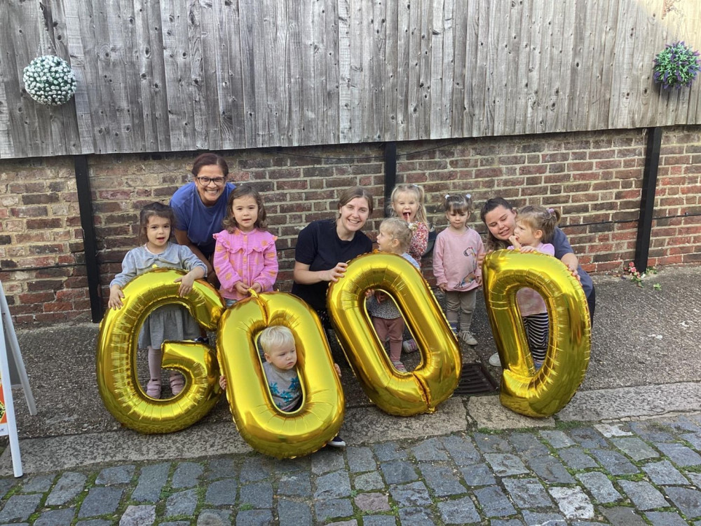 The team and children at Dicky Birds Day Nursery & Preschool in Claremont Road in Surbiton celebrating their ‘Good’ Ofsted rating.(Photo: Supplied)