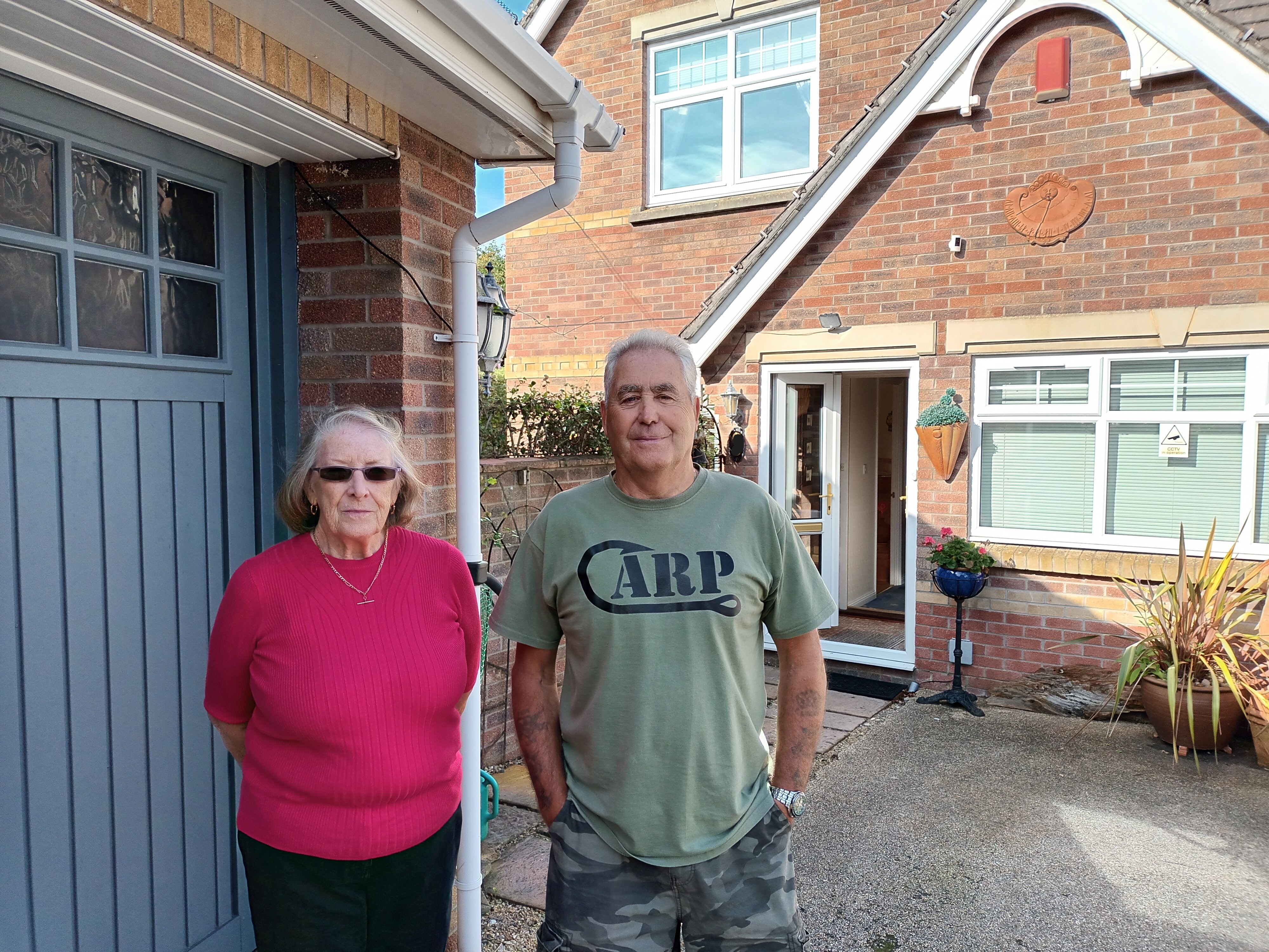 Graham Underdown MBE and his wife Jean who have been living with a footpath running up their driveway on Clos Cwm Barri for more than 20 years