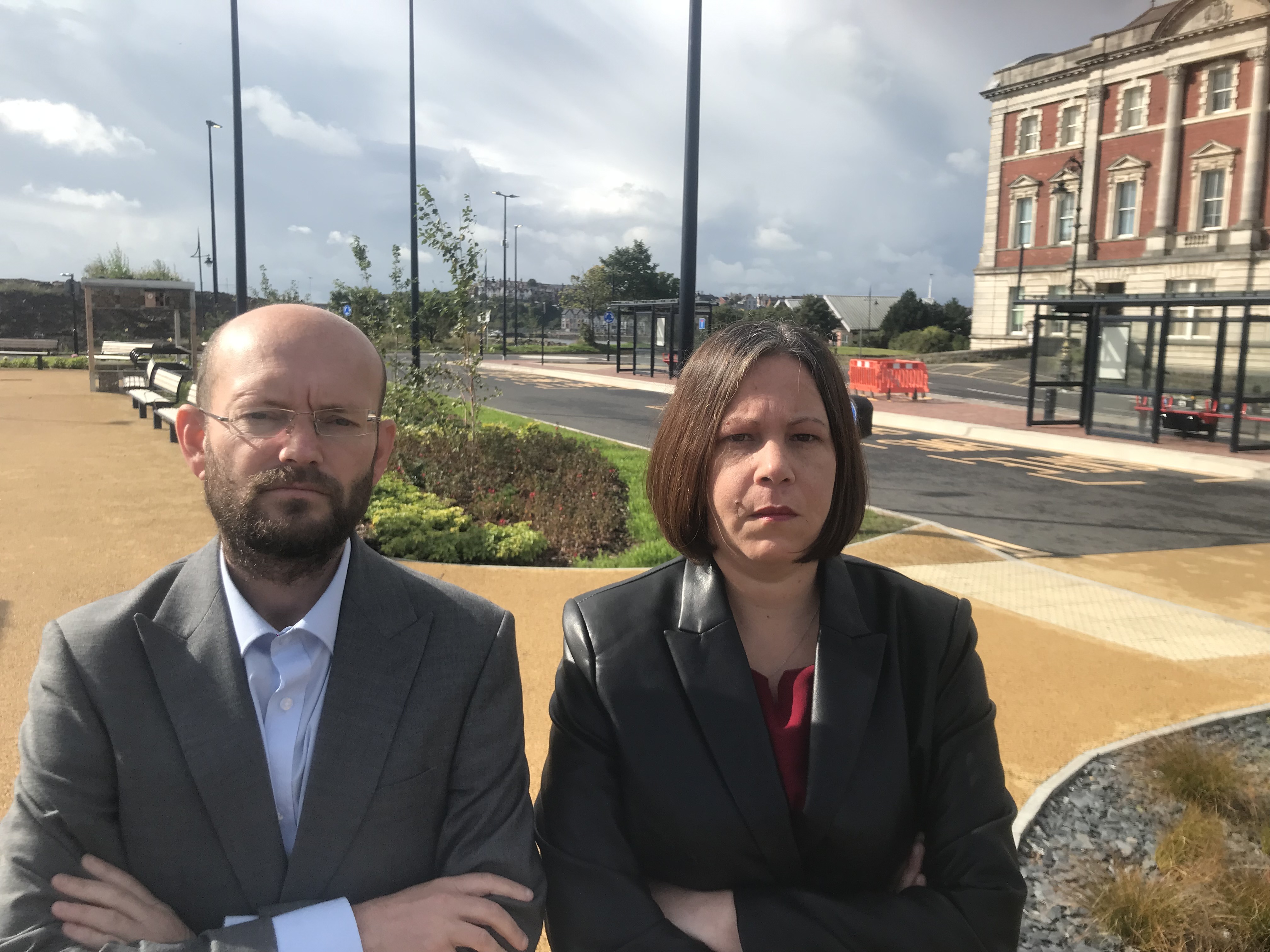 Cllr Ian Johnson and Cllr Millie Collins at the Barry Docks Bus Station which has four bus shelters, but no buses.