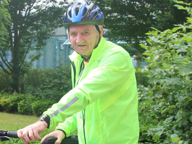 Derek will clock up the miles in his first static bike ride, taking place at The Rising Sun pub (Image - Stockport NHSFT)
