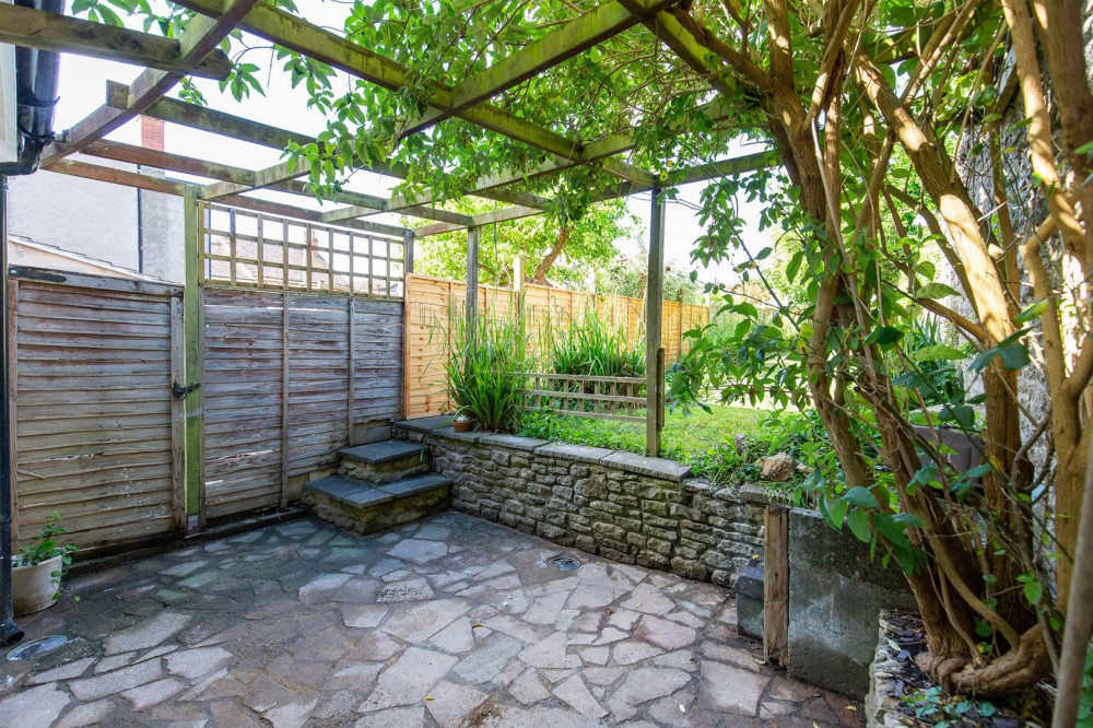 The home on Alexandra Road has a large laid to lawn along with a pergola. Photo Rivendell Estates