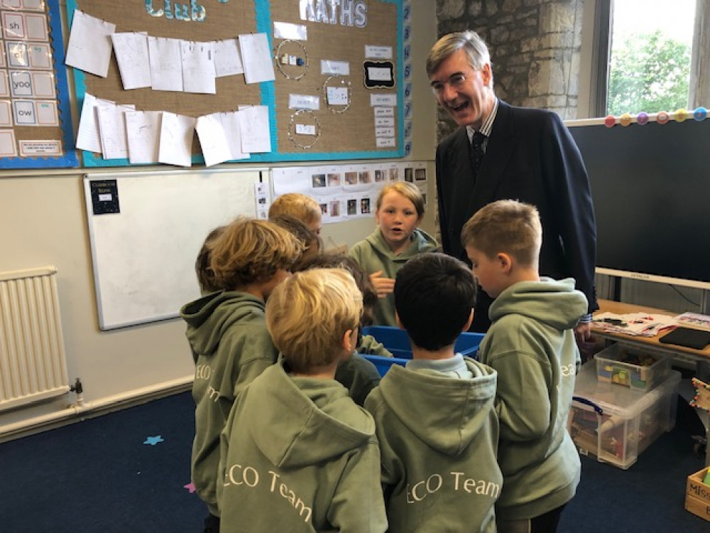 Midsomer Norton MP Jacob Rees Mogg with the pupils at Shoscombe School 