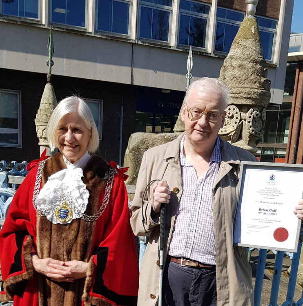 Brian Gaff pictured here receiving his award from the Mayor of Kingston / Credit: Kingston Council