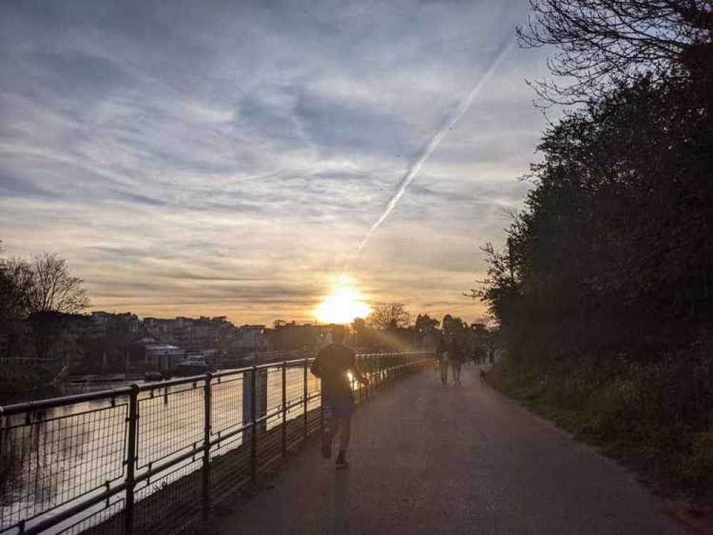 A runner on the Thames towpath, part of the Kingston parkrun route