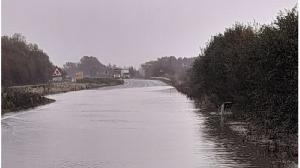 Caption: Flooding on the westbound carriageway of the A303