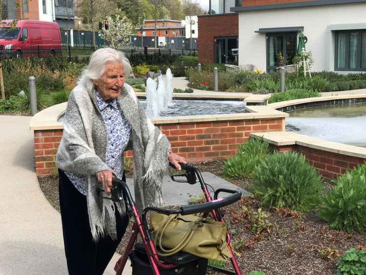 Margaret completes a lap around the High Wycombe Home's fountain / Courtesy of Royal Star & Garter