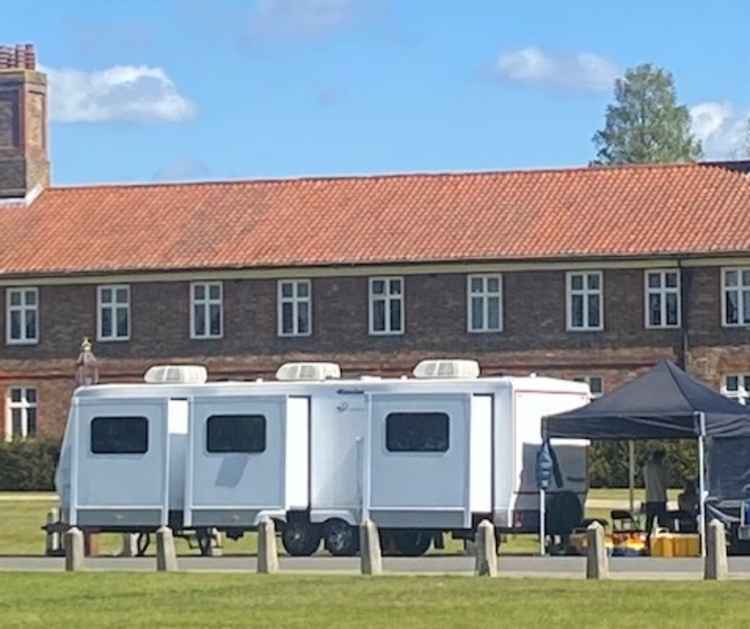 Trailers and tents were seen outside the palace