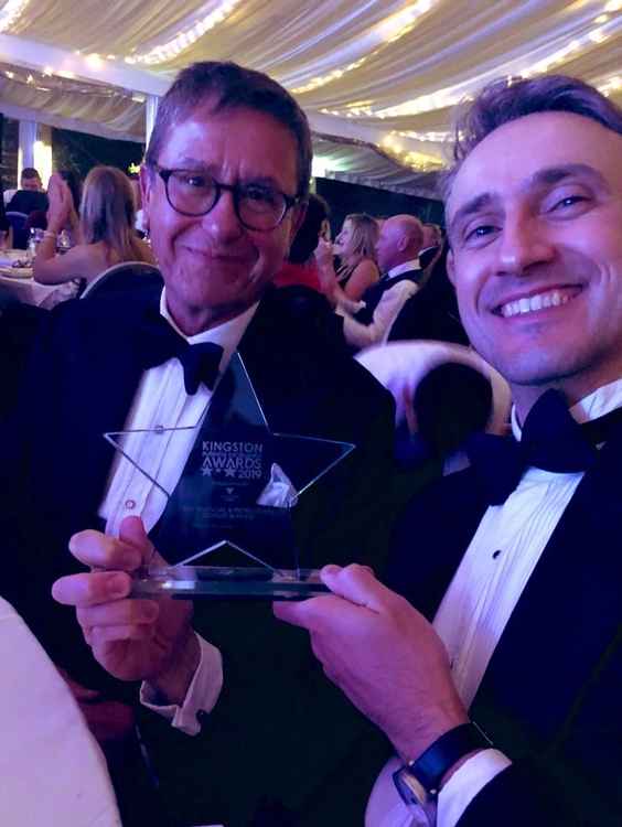 Amyr and Managing Partner Chris Hirsch with the company's award at the Kingston Business Awards