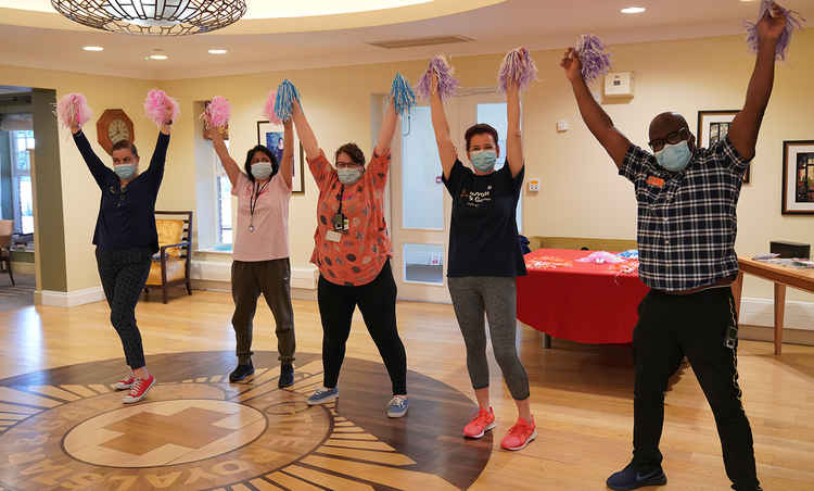 Staff at the care home rehearse for a special dance performance at the party