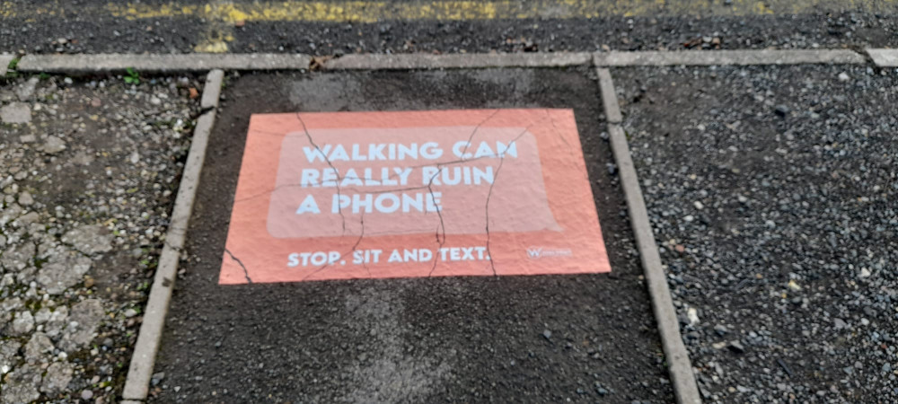 'Walking can really ruin a phone' is the message from Warwickshire County Council’s road safety education team (image via WCC)