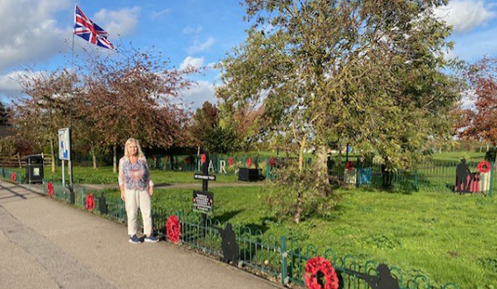 East Tilbury councillor Sue Sammons stands proudly in front of the Gobions Park tribute created by her husband Ed. 