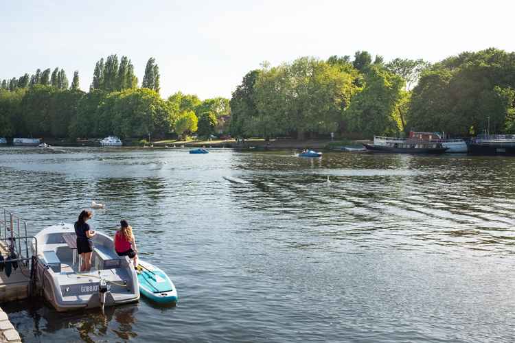 Anyone for a paddleboard? Riverside activities proved popular as temperatures soared (Credit: Ollie Monk)