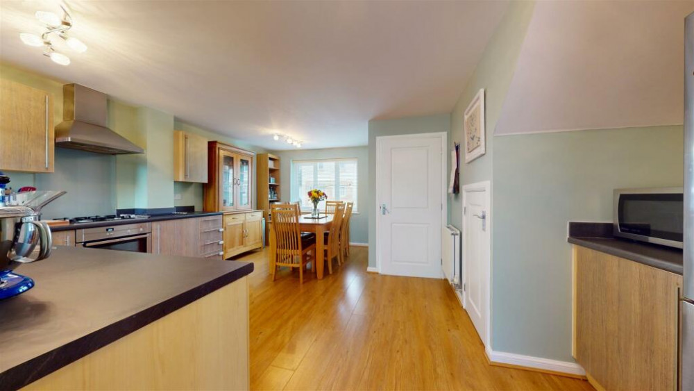 The open plan kitchen in the home on Woodpecker Avenue in Midsomer Norton