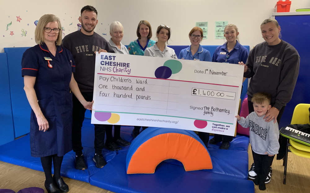 Stewart, Charley, Marley and Claire Finley and staff from the Children’s Ward at Macclesfield Hospital. 