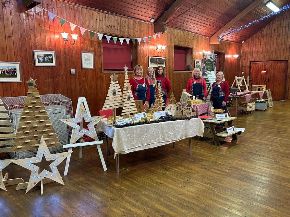 £260 has been raised by a group of creatives making festive 'wooden goodies' ahead of the festive period. Image credit: Men & Women in Sheds.