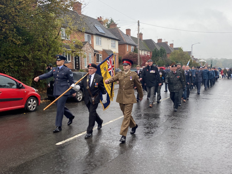 Locals lined the streets to watch the parade head to the war memorial on Sunday (image by James Smith)