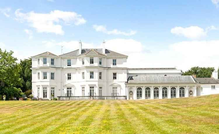 Kingston Hill Place was built in 1828 and has a typical late-Georgian elegance (Credit: Savills Wimbledon via Rightmove)