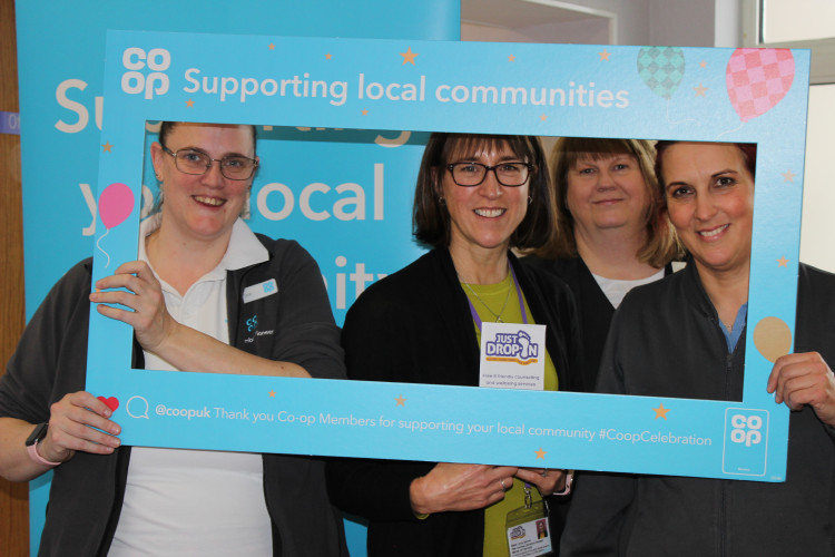 Left to Right: Co-op Macclesfield Member Pioneer Tina Davies-Wrench, Just Drop In's Jenny Spencer, Joanne Taylor of Co-op Funeralcare High Street Macclesfield and Jennifer Austen of London Road Co-op. (Image - Macclesfield Nub News)