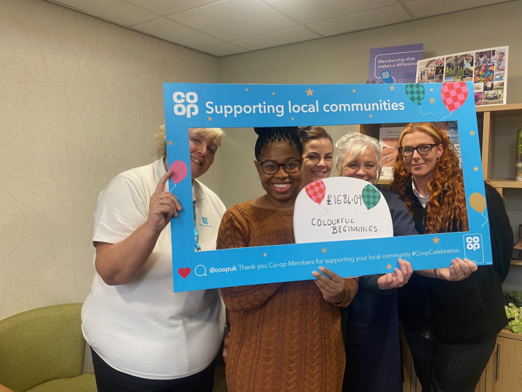 Ola Adegbenro of Colourful Beginnings with Claire Mason (left) and Rianna McGillivray, Emma Hubbard and Lynne Love from Co-op Funeral Care. 