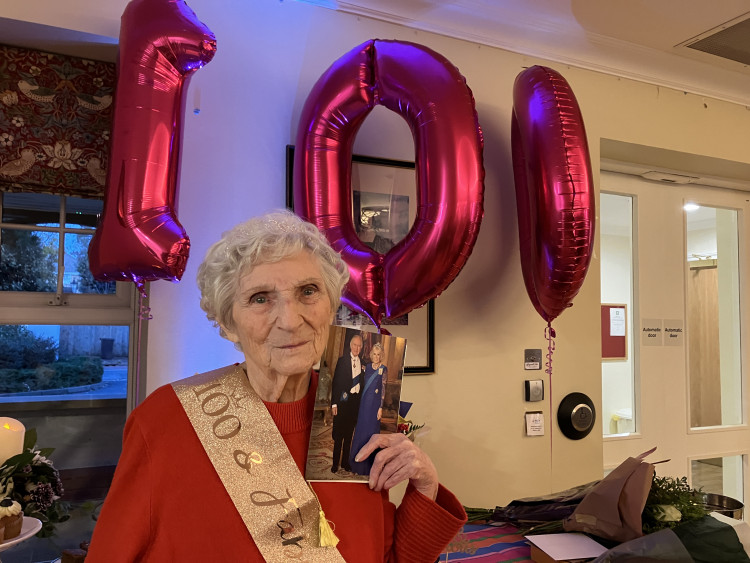 Irene with her card from His Majesty The King. (Photo: Royal Star & Garter)