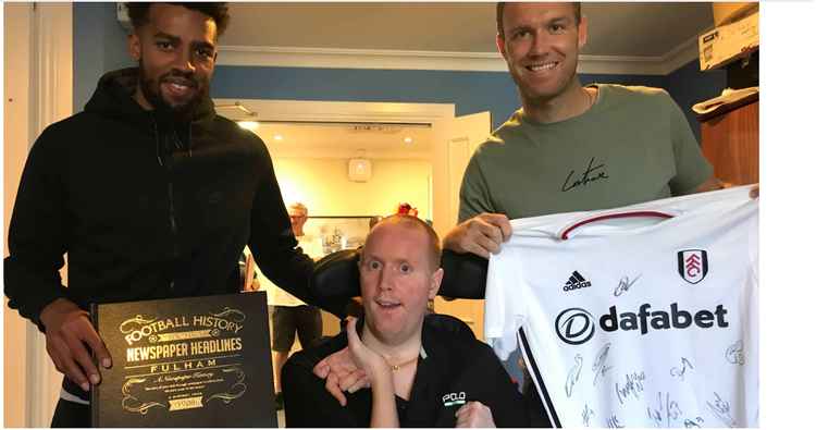 Stephen is a massive Fulham fan and was visited by players Cyrus Christie and Kevin McDonald in 2019 (Credit: Royal Star and Garter)