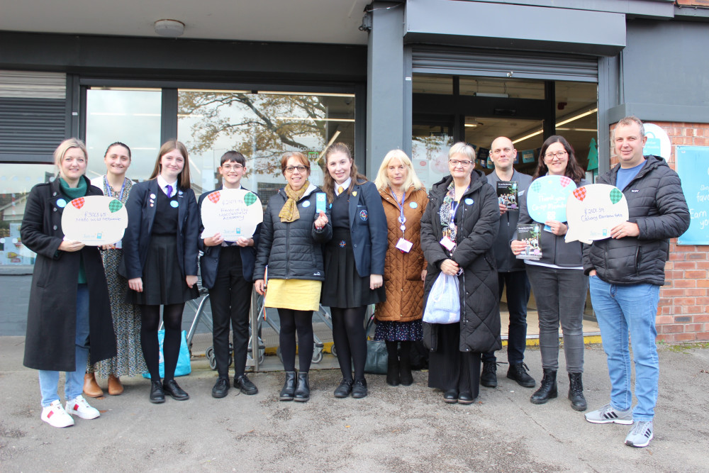 Left to right: Dr. Emma Passmore of Macc Wild Network, staff and students of The Macclesfield Academy, David Dundas of Co-op Ivymeade, Co-op Member Pioneer Louise Little and Calvary Church Pastor Gary Holdcroft. (Image - Macclesfield Nub News)