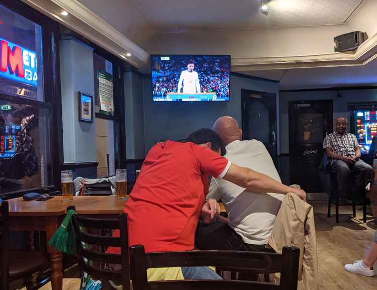 Regulars at the pub can't bear to look as England lose another penalty (Credit: Nub News)