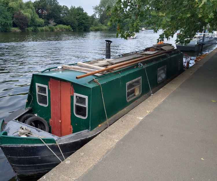 The boat was an illegal mooring at Surbiton riverside and has been removed by the Council (Credit: Kingston Council)