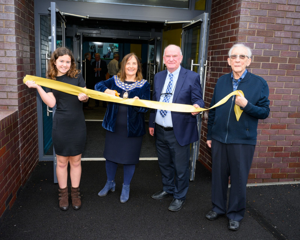 From left - Youngest member of Talisman Theatre's Youth Theatre Lucy Henderson with Mayor of Kenilworth and theatre patron (centre) Alix Dearing cutting the ribbon alongside theatre Chairman Nigel Elliott and David Charlton, President of the theatre cutting the ribbon at the opening (image by Peter Weston)