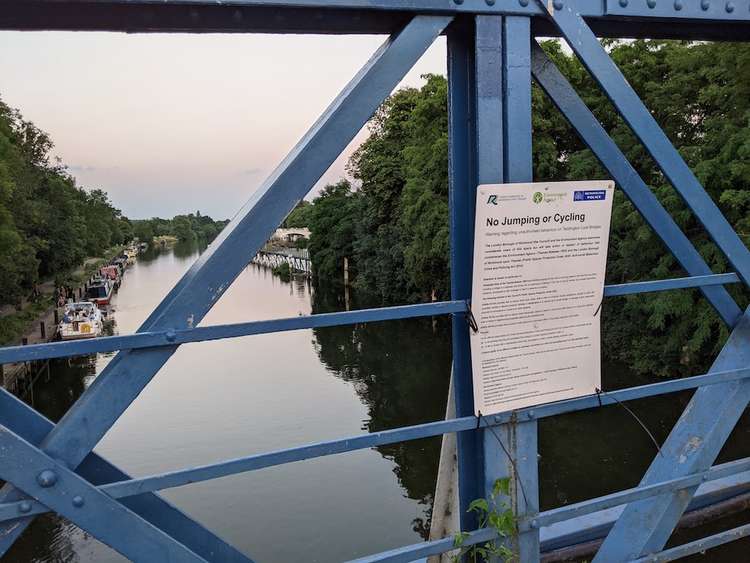 Signs on the bridge explain the rules (Credit: Nub News)