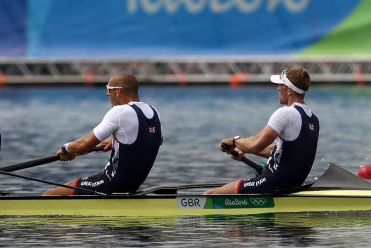 The duo led 20 other members of the British squad out to the koku-ritsu Olympic stadium (Credit: BBC)