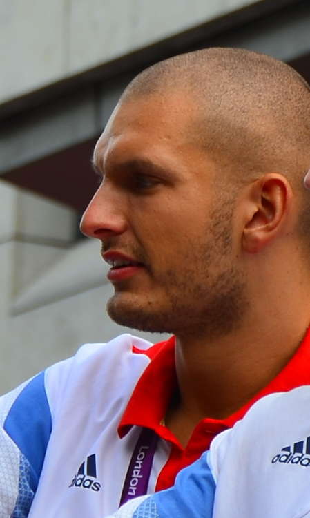 Moe won a gold medal at Rio in 2016 as part of the GB Coxless four. Pictured at the London 2012 Olympic Parade (Credit: Ben Sutherland)