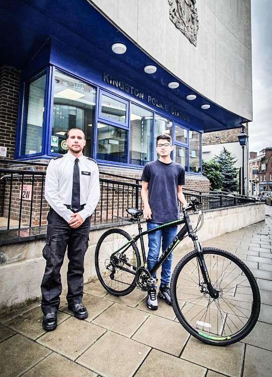 The owner of the stolen bicycle was overjoyed to be reunited with his vehicle a month after it was stolen (Credit: Kingston police)