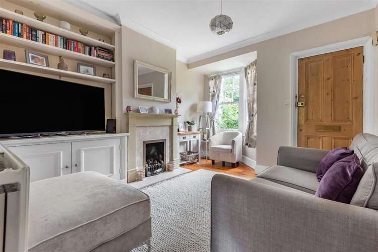 The living room, where the main entrance is located, boasts an attractive bay window (Image: Matthew James)