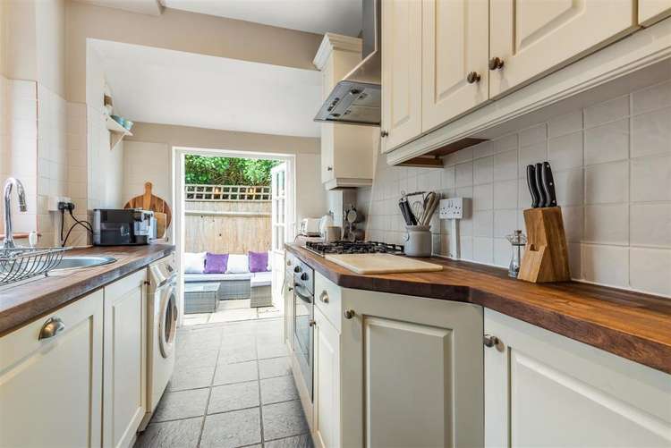 The kitchen, which leads onto the garden via french doors (Image: Matthew James)