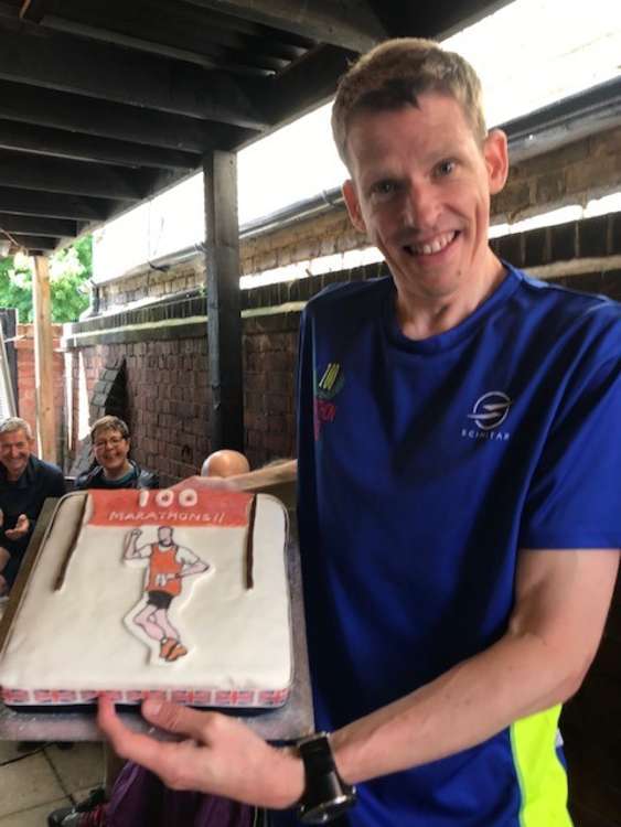 Michael with the cake his mum made to mark the occasion! (Image: Michael Wiggins)