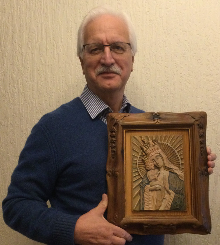 Author Bryan Wiles, with the copy that he carved of the Tadeusz Zielinski icon, the Mother of God Victorious, which was displayed at the altar before all the battles of the Second Polish Corps