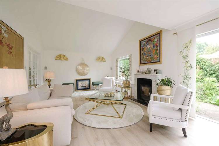 The living room looks out onto the garden (Image: Coombe Residental)