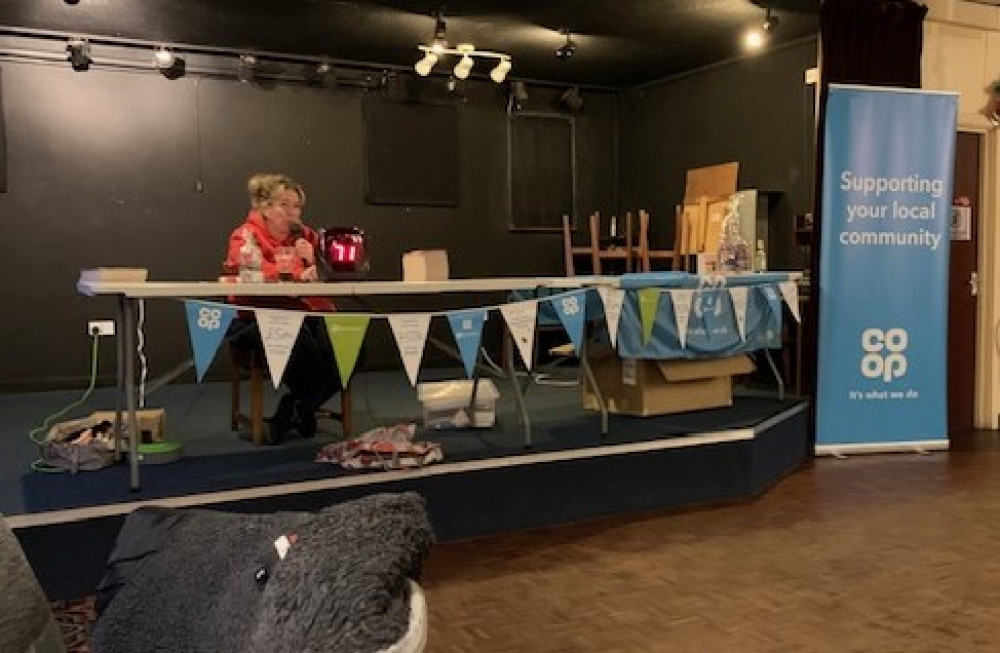 Nyree calling the bingo at Falmouth Football Club on Children in Need fundraising night (Credit: Lesley Perkins)