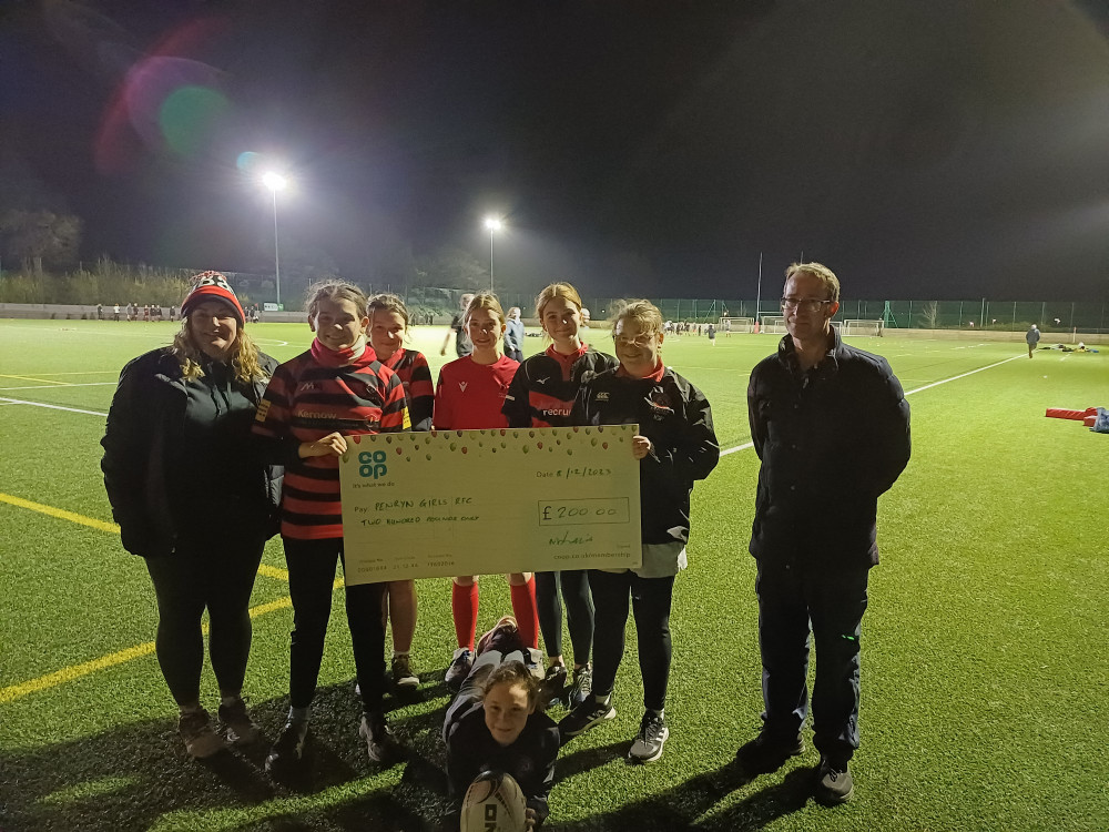 Penryn Girls Rugby Club presented with cheque from Co-op Local Community Fund (credit Co-op)