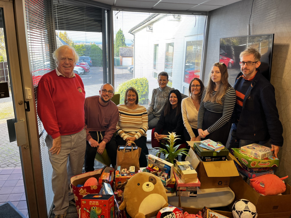 CWA team with Bill Bowley from local charity, Toys on the Table. Photo: CWA